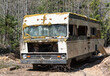 canvas print picture - Moss Covered Recreational Vehicle Discarded and Abandoned in woods, Vancouver Island, British Columbia