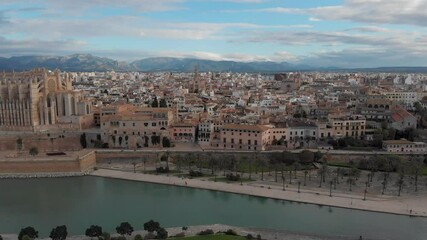 Wall Mural - Palma de Mallorca cityscape. Cathedral La Seu of Santa Maria Royal Palace of La Almudaina, old architecture drone top point of view, sunny day. Travel, landmark, famous place. Balearic Islands. Spain