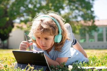 On line kid learning in school park. Concept of outdoor child education.