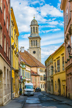 Narrow Street In The Old Town Of Sopron Templom Utca Street With An Evangelic Church At The Very End In Hungary