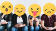 © Rawpixel.com - Diverse people with emoticons using mobile phones