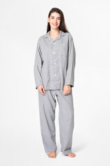 Wall Mural - Woman in gray pajamas comfy sleepwear apparel full body