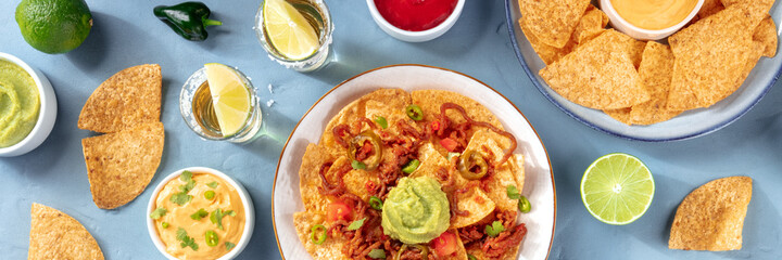 Mexican menu panorama with nachos and tequila, overhead flat lay