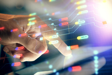 Fototapete - Multi exposure of man's hand holding and using a digital device and data theme drawing. Innovation concept.