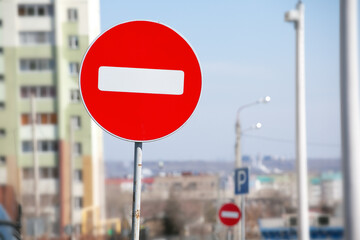 Road Sign DO NOT ENTER On The Background Of The Urban Landscape. Concept Road Traffic, Accident, Violation, Police, Accident