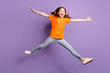 Full length body size view of attractive girlish cheerful girl jumping having fun isolated over violet purple color background