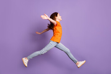 Full length body size profile side view of nice cheerful girl jumping walking hugging isolated over violet purple color background