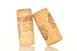 © Oleksandr - Two light brown wine corks, close-up, isolated on white.