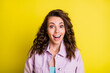 © deagreez - Portrait of attractive cheerful amazed wavy-haired girl good news reaction isolated over bright yellow color background