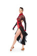 © belyaaa - Beautiful young latino dancer woman in an amazing and shiny dress.