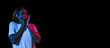African young woman's portrait on dark studio background in neon. Concept of human emotions, facial expression, youth, sales, ad.