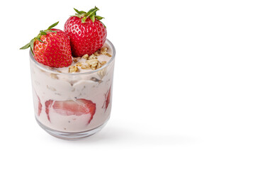 homemade delicious layered dessert of yogurt, muesli and strawberries isolated on white