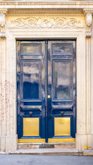 Wall Mural - Paris, an ancient blue wooden door, typical building in the center