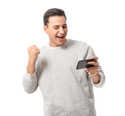 Canvas Print - Happy young man with mobile phone on white background