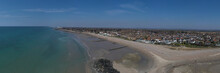 Beautiful Aerial Panoramic View Along The Sweeping Beach Of Middleton On Sea Towards Bognor Regis In West Sussex, A Popular Destination For Tourists.