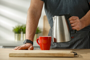 Wall Mural - Morning in a sunny kitchen and a table before breakfast 