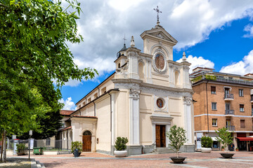 Wall Mural - White church on small town square in Alba, Italy.