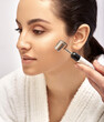© Peakstock - Facial roller massager. Woman getting procedure facial rejuvenation and lifting with face roller massager, high quality