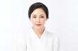 © kitthanes  - Beautiful young Asian woman wearing bathrobe on white background, Face care, Facial treatment, Cosmetology, beauty and spa Concept.