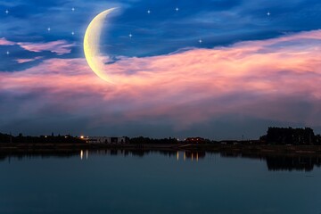 Wall Mural - crescent moon with beautiful sunset background . bright sky