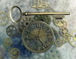Steampunk clock and key with gears and cogs.