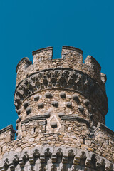 Poster - Low angle shot of the tower of a castle Manzanares in Madrid