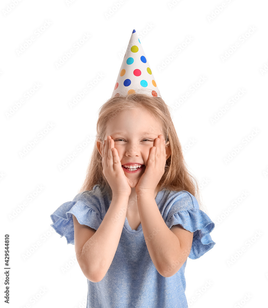 Cute little girl in party hat on white background