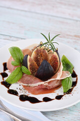 Wall Mural - The delicate taste of prosciutto is ideally combined with the sweetness of figs.