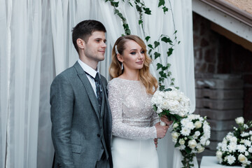 Wall Mural - Young couple making vows at a wedding