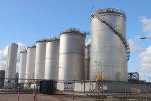 Oil Tanks For Storage At Terminal In The Botlek Harbor In The Port Of Rotterdam