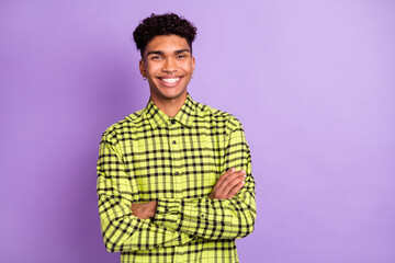 Sticker - Photo of happy confident afro american man hold hands crossed smile isolated on violet color background