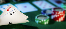 Play Poker In Casino. Pocket Aces With Chips  And Cards On Table. Copy Space