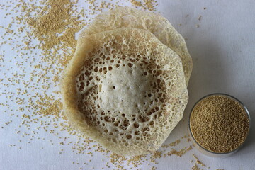 Wall Mural - Hoppers made with foxtail millets. An experimental version of a popular Kerala dish called Appam