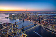 © JCB - Aerial view of Lower Manhattan with Brooklyn Bridge and Manhattan Bridge at sunset, New York City, USA