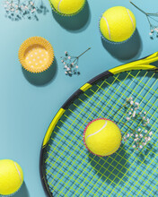 Holliday Sport Composition With Yellow Tennis Balls And Racket On A Blue Background Of Hard Tennis Court. Sport And Healthy Lifestyle. The Concept Of Outdoor Game Sports. Flat Lay