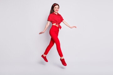 Sticker - Full length photo of funny girl jump step wear red dotted blouse pants shoes isolated grey color background