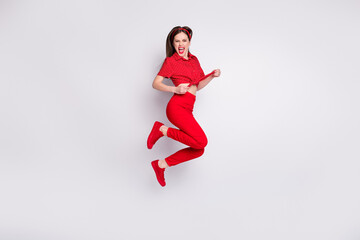 Poster - Full length photo of crazy lady jump excited open mouth wear red dotted blouse trousers footwear isolated grey color background