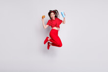 Full Length Photo Of Adorable Charming Young Woman Dressed Pin-up Outfit Eating Junk Food Isolated Grey Color Background