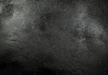 Black Textured Wet Asphalt Background.