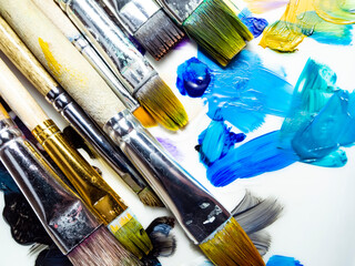 Old brushes for painting,smeared with colored paint