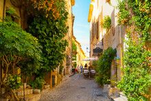 A Picturesque Back Street In The Medieval Hilltop Village Of Saint-Paul De Vence In The Provence Cote D'Azur Region Of Southern France.