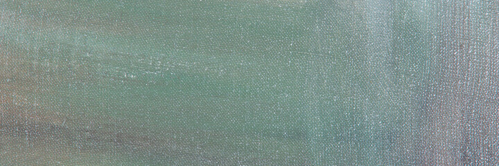 creative background of multi-colored primers on linen canvas surface, toning, temporary object