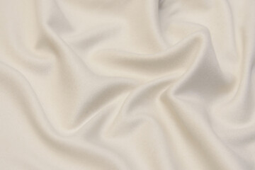 Wall Mural - The texture of cashmere fabric beige. Background, pattern.