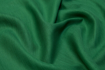 Wall Mural - Green Abstract background. Green linen fabric texture, background. Green fabric.