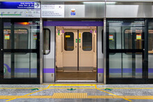 View Of A Metro Train With Open Doors Standing At The Platform For Passengers During The Rush Hour At A Metro Station In East West Metro System Kolkata, West Bengal, India