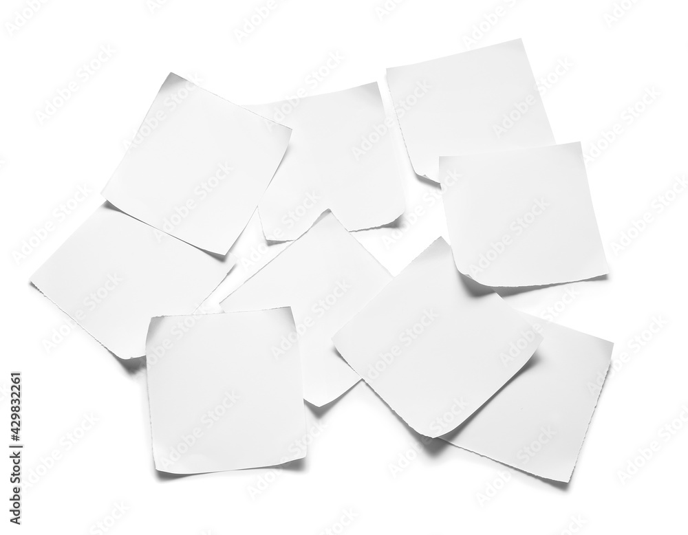 Blank sheets of paper on light background