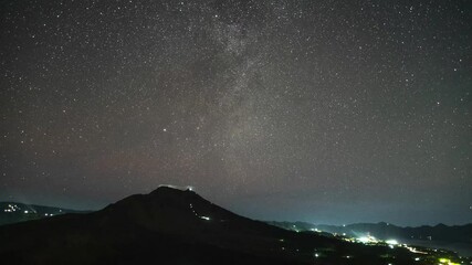 Wall Mural - Landscape of Mount Batur Volcano and Lake in Kintamani, Bali, Indonesia - Nightscape Sky Starry Night Stars Milky Way Astro Time Lapse