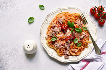 Wall Mural - Spaghetti pasta with tuna in tomato sauce. Top view with copy space.