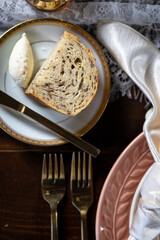 Wall Mural - Bread and butter on a side plate - wedding table