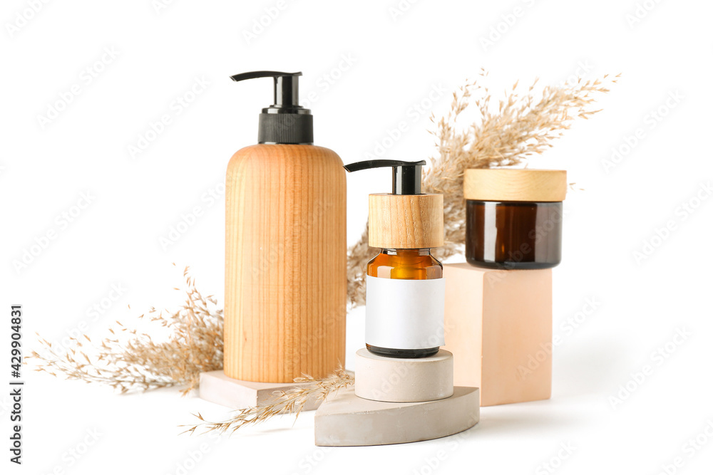 Composition with natural hair cosmetics on white background